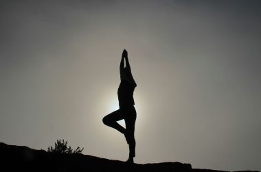 person doing yoga exercises