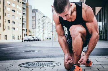 man tying his shoes