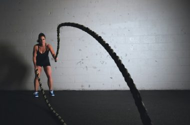 woman holding brown ropes